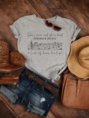 Shes Mean And Shes Kind Strong And Divine And Lord Only Knows How Tough Shirt Zach Bryan Shirt Country Shirt Country Sweatshirt Unique riracha 2