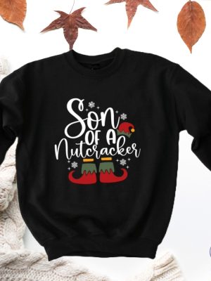 Funny Christmas Son Of A Nutcracker Shirt Hoodie Sweatshirt Gift Holiday Spirit Shirt Cute Christmas Elf Tee Party Outfit Gift For Her Gift For Him riracha 10