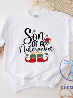 Funny Christmas Son Of A Nutcracker Shirt Hoodie Sweatshirt Gift Holiday Spirit Shirt Cute Christmas Elf Tee Party Outfit Gift For Her Gift For Him riracha 4