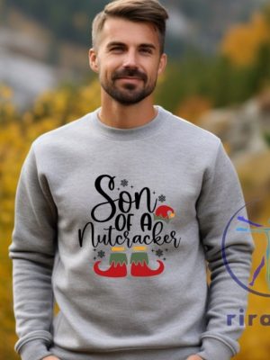 Funny Christmas Son Of A Nutcracker Shirt Hoodie Sweatshirt Gift Holiday Spirit Shirt Cute Christmas Elf Tee Party Outfit Gift For Her Gift For Him riracha 6