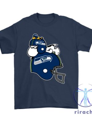 Snoopy And Woodstock Resting On Seattle Seahawks Helmet Shirts Hoodie Tshirt Sweatshirt Tee Gift For Nfl Lover Hoodies Unique riracha 1 2